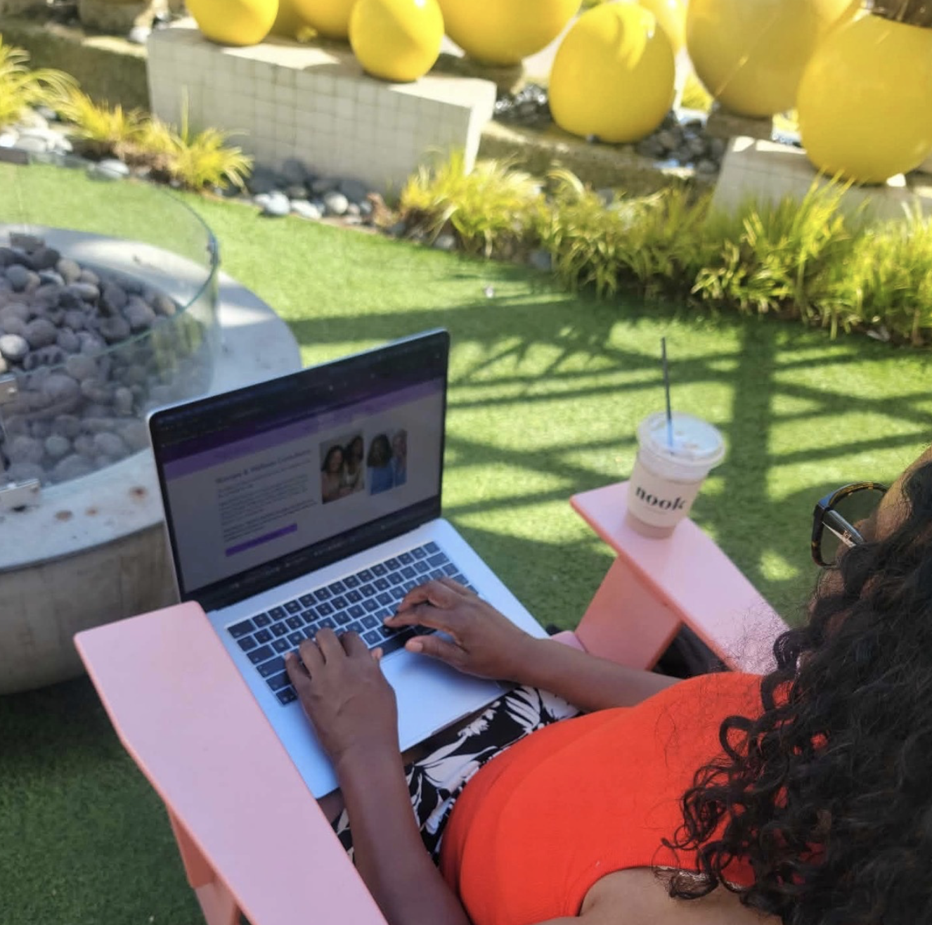 Evelyn Abernathy practicing self-care while working outdoors at The Enclave